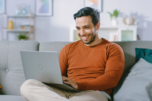 man using laptop